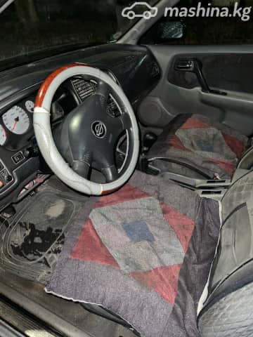 Nissan Primera II (P11) Рестайлинг 1.6 MT