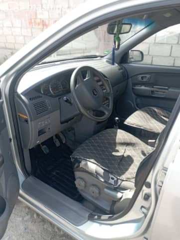 Kia Carens I (RS) Рестайлинг 1.8 MT