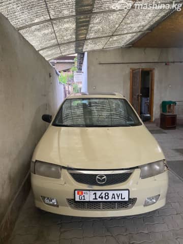 Mazda 323 V (BA) 1.5 AT