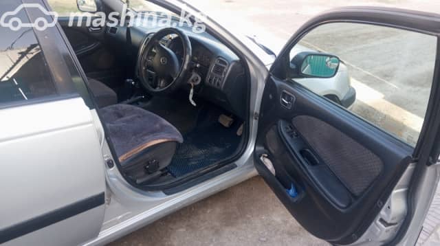 Toyota Avensis I Рестайлинг 1.8 AT
