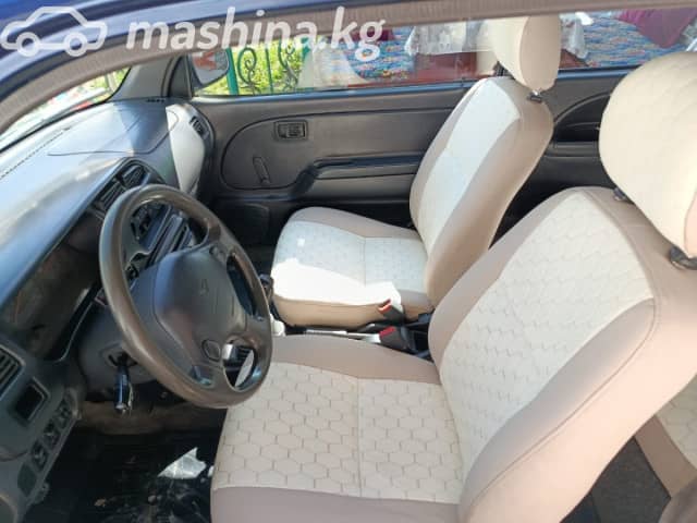 Daihatsu Cuore V (L700) 1.0 MT