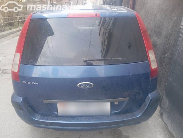 Ford Fusion I Рестайлинг 1.6 MT