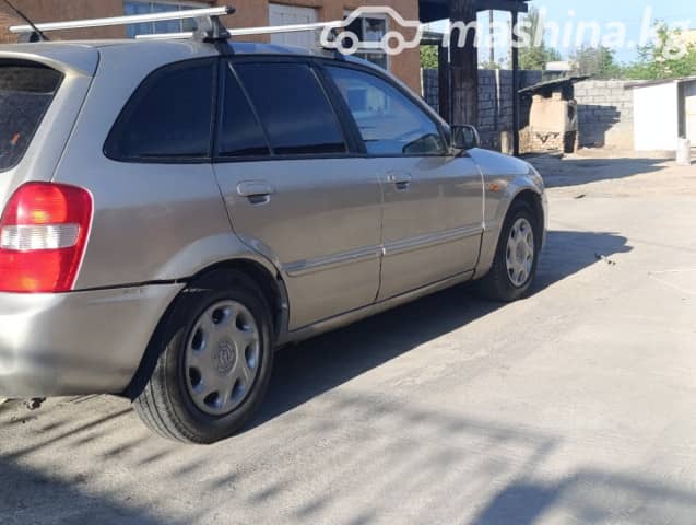 Mazda 323 VI (BJ) Рестайлинг 1.5 MT