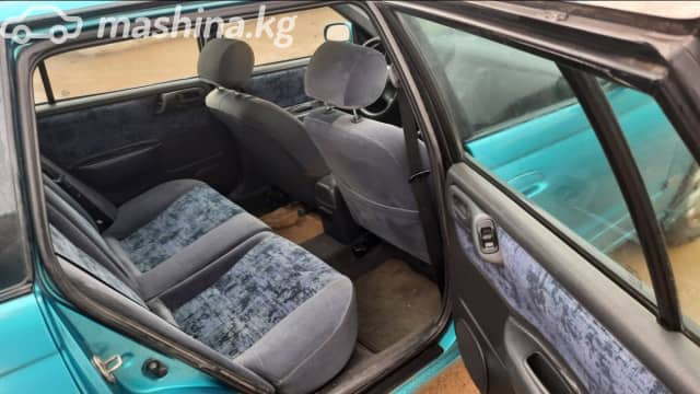 Toyota Carina VI (T190) E 1.8 MT