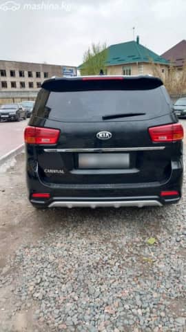 Kia Carnival III 3.3 AT