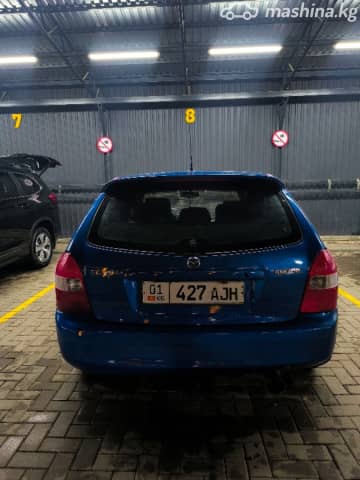 Mazda 323 VI (BJ) Рестайлинг 1.6 MT
