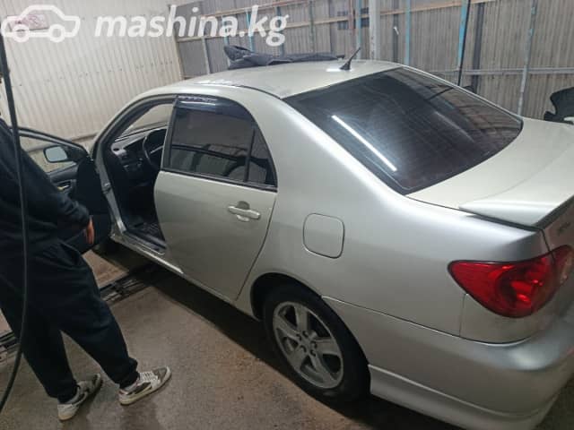 Toyota Corolla IX (E120, E130) 1.8 AT