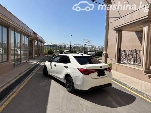 Toyota Corolla XI (E160, E170) Рестайлинг 2 Axio 1.5hyb CVT
