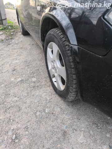Nissan Primera III (P12) 1.8 MT