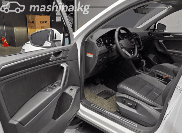 Volkswagen Tiguan II Рестайлинг 2.0d AMT 4WD