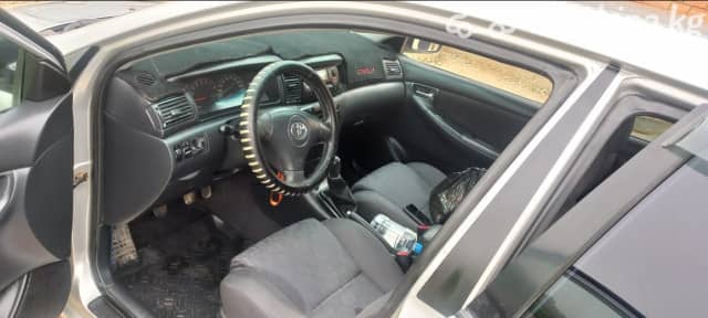 Toyota Corolla IX (E120, E130) 1.6 MT