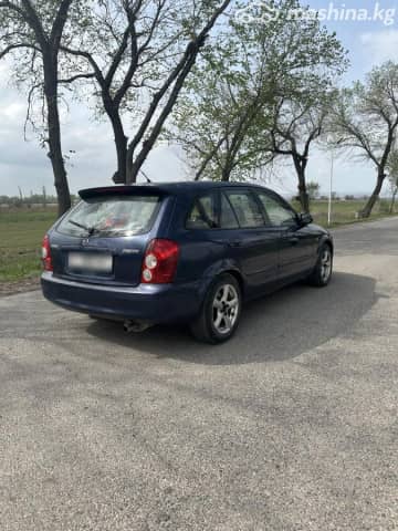 Mazda 323 VI (BJ) Рестайлинг 1.6 MT