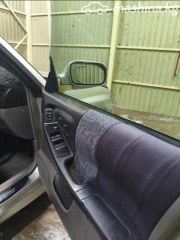 Subaru Forester I Рестайлинг 2.0 AT 4WD