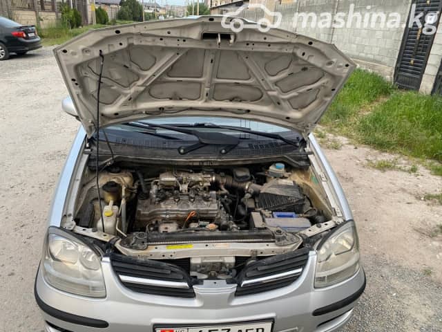 Nissan Almera Tino 1.8 MT