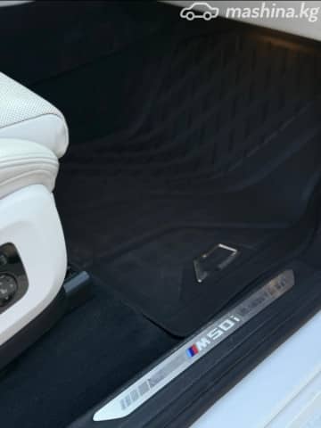 BMW X7 I (G07) M50i 4.4 AT 4WD