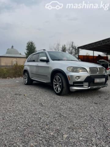 BMW X5 II (E70) 48i 4.8 AT 4WD