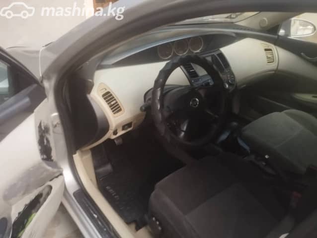 Nissan Primera III (P12) 1.8 MT