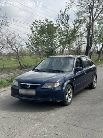 Mazda 323 VI (BJ) Рестайлинг 1.6 MT