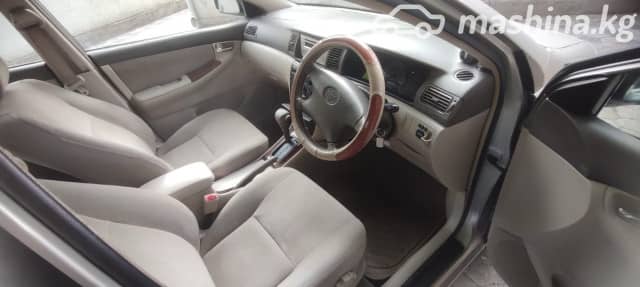 Toyota Corolla IX (E120, E130) 1.5 AT