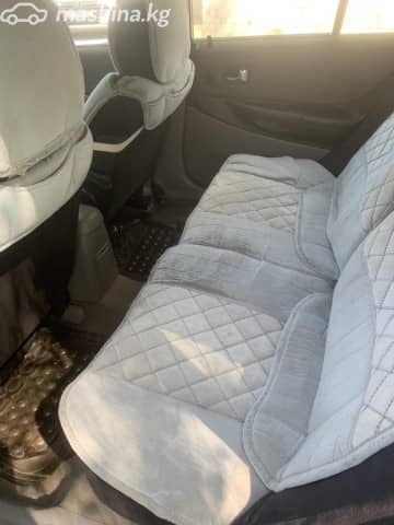 Mazda 323 VI (BJ) Рестайлинг 1.6 MT
