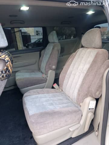 Kia Carnival III 3.3 AT