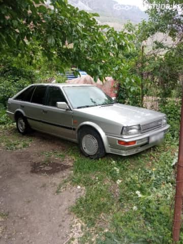 Nissan Bluebird VIII (T12, T72) 2.0 MT