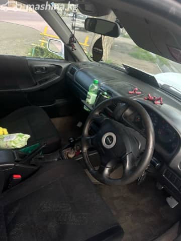 Subaru Forester I Рестайлинг 2.0 MT 4WD