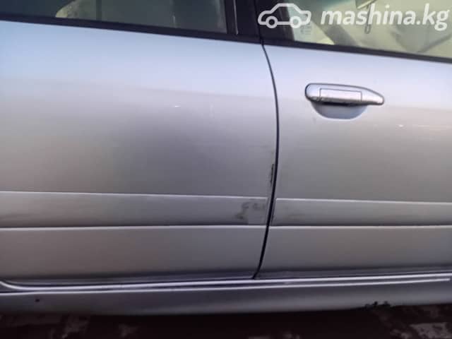 Nissan Primera II (P11) Рестайлинг 1.8 MT