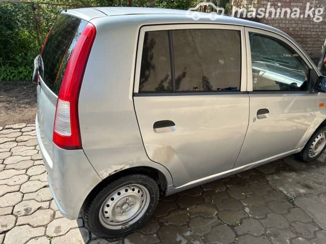 Daihatsu Cuore VI (L251) 1.0 MT