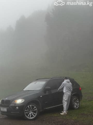 BMW X5 II (E70) 48i 4.8 AT 4WD
