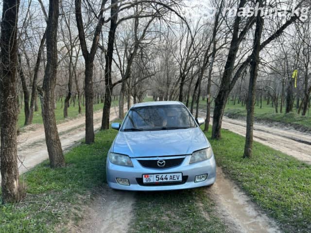 Mazda 323 VI (BJ) Рестайлинг 1.6 MT