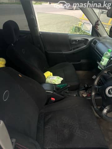 Subaru Forester I Рестайлинг 2.0 MT 4WD