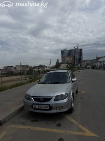 Mazda 323 VI (BJ) Рестайлинг 1.6 MT