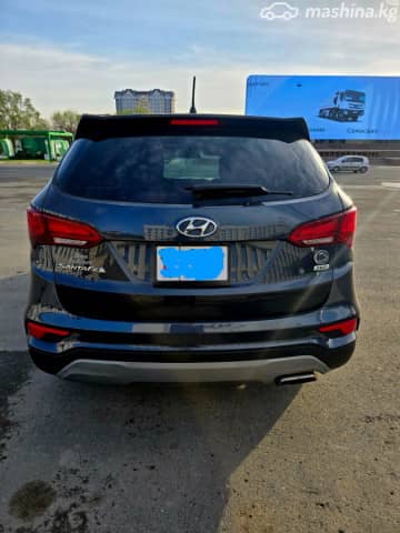 Hyundai Santa Fe III Рестайлинг 2.4 AT 4WD