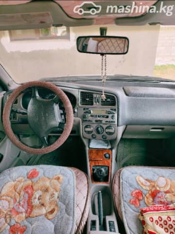 Nissan Primera II (P11) Рестайлинг 1.8 MT