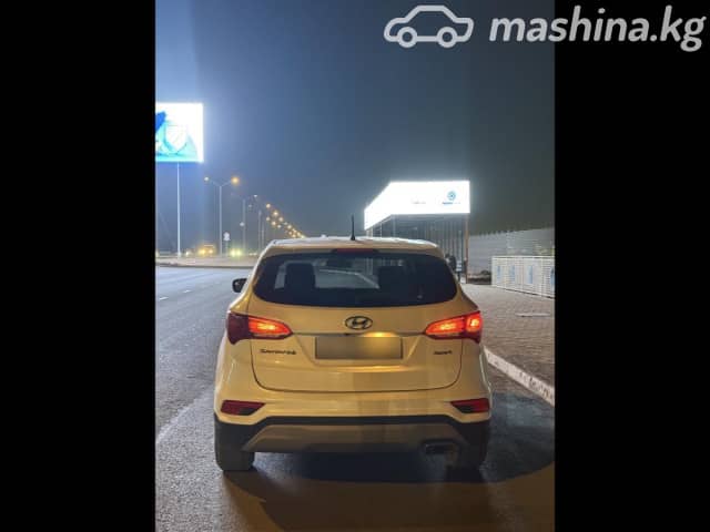 Hyundai Santa Fe III Рестайлинг 2.4 AT