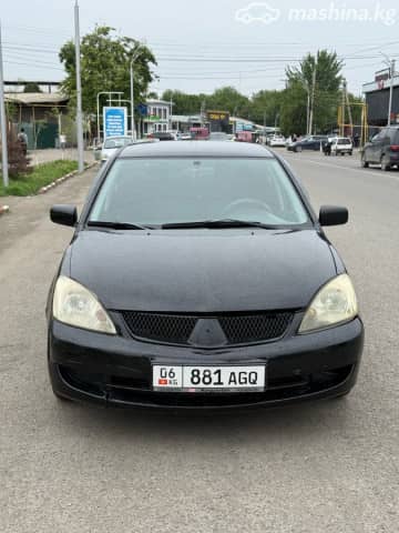 Mitsubishi Lancer IX Рестайлинг 1.6 AT
