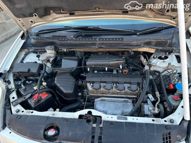 Honda Stream I Рестайлинг 1.7 AT 4WD