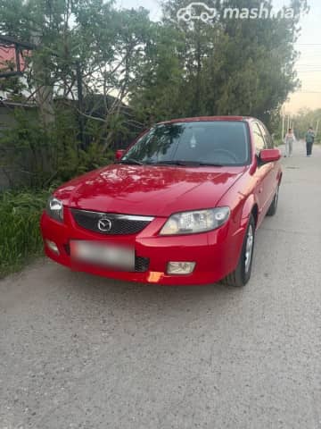 Mazda 323 VI (BJ) Рестайлинг 1.6 MT