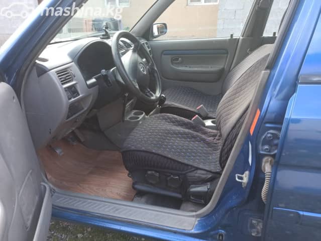 Mazda Demio I (DW) 1.5 MT
