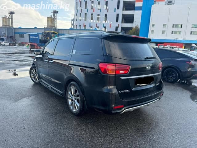 Kia Carnival III 3.3 AT