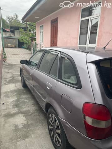 Mazda 323 VI (BJ) Рестайлинг 1.6 MT