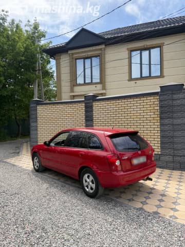 Mazda 323 VI (BJ) Рестайлинг 1.6 MT