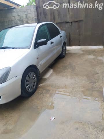 Mitsubishi Lancer IX Рестайлинг 1.3 MT