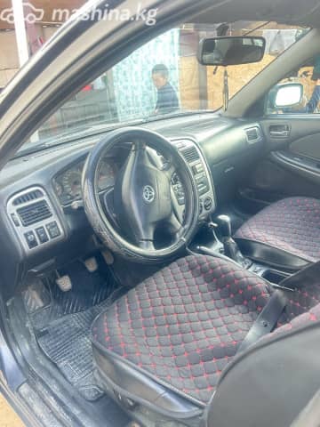 Toyota Avensis I Рестайлинг 1.6 MT