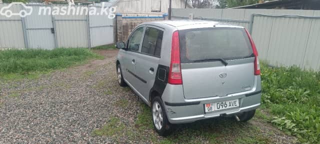 Daihatsu Cuore VI (L251) 1.0 MT