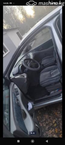 Nissan Almera Tino 1.8 MT