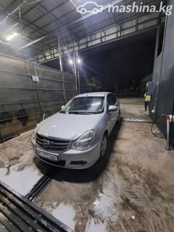 Nissan Almera III (G15) 1.6 MT