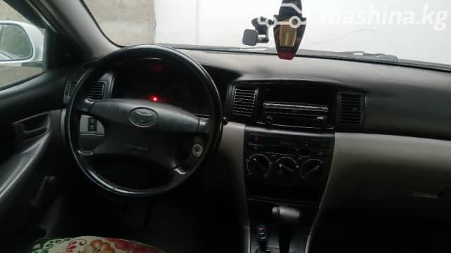 Toyota Corolla IX (E120, E130) 1.5 AT