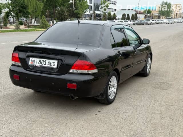 Mitsubishi Lancer IX Рестайлинг 1.6 AT
